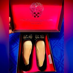 Brand new in box Vince Camuto comfortable black flats with gold accents.